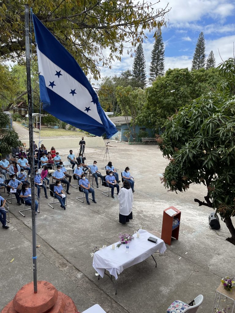 Group of high school students standing in school yard